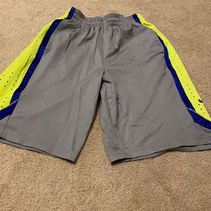 Neon and blue and grey Nike basketball shorts